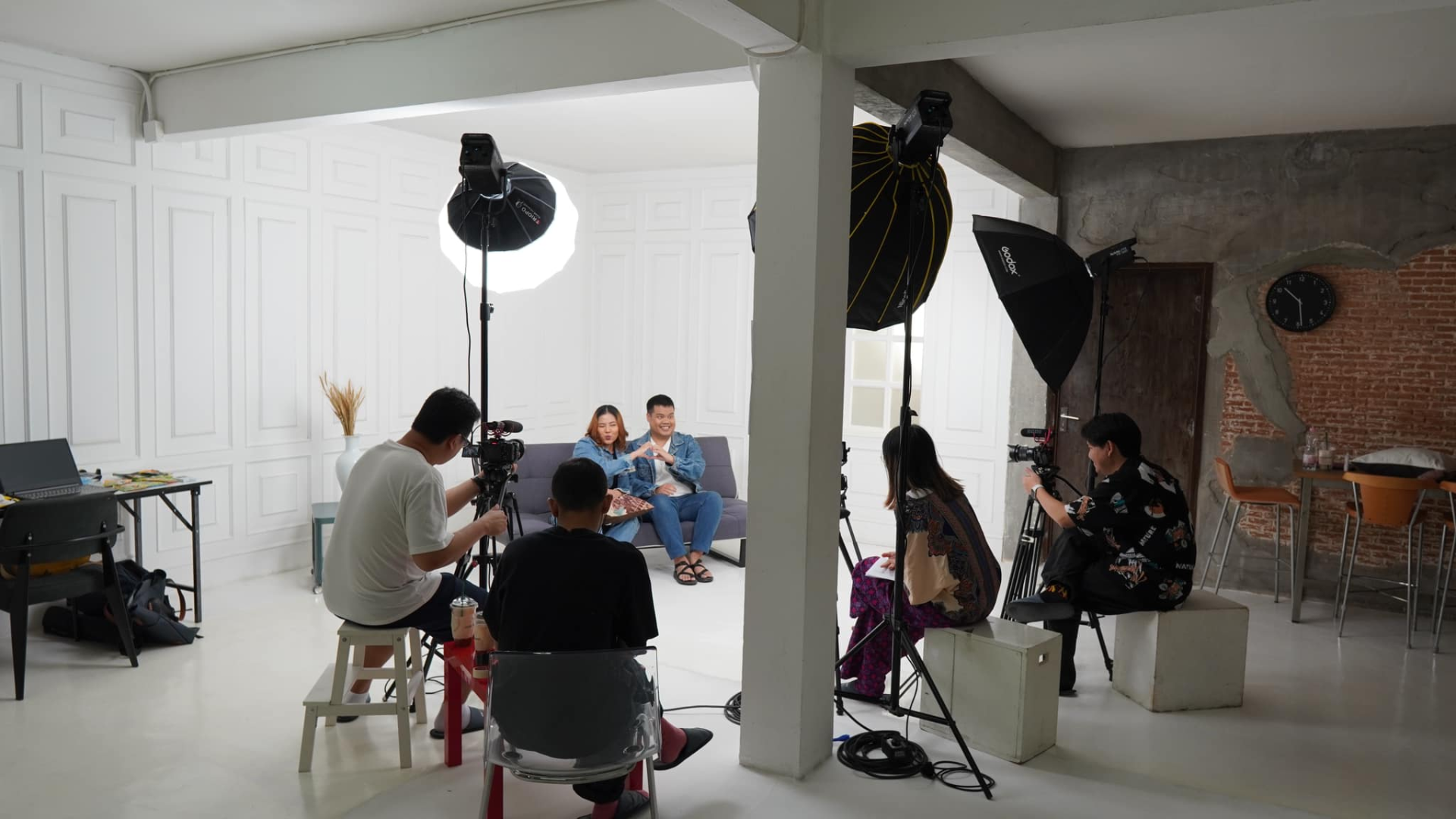 Photo of the Deep Doc Media team filming in the studio